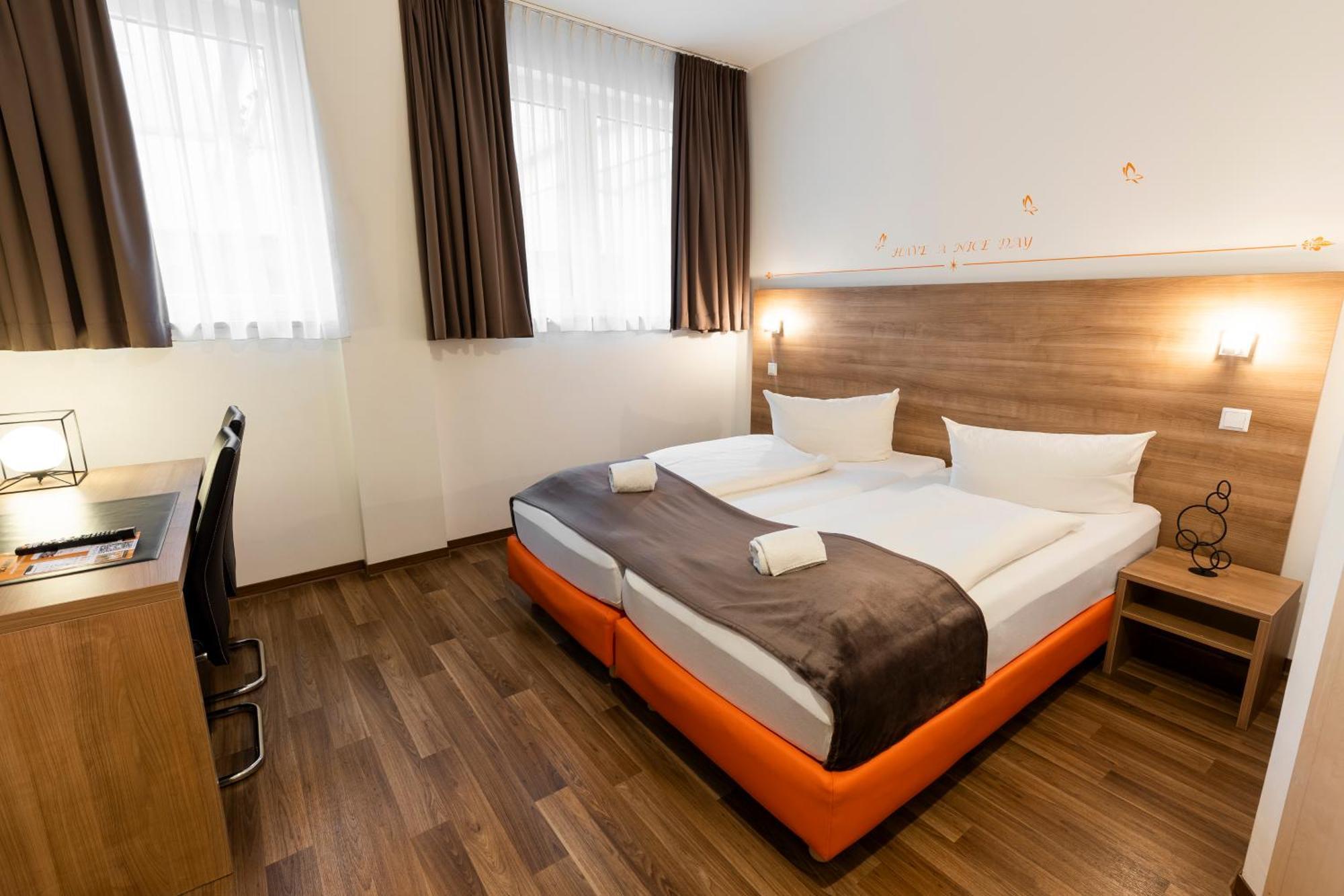 Orange Hotel Und Apartments Ной-Ульм Екстер'єр фото